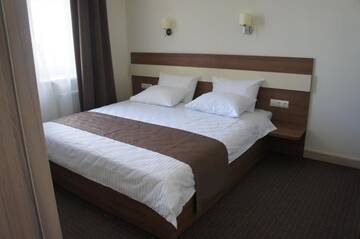 Фото номера Люкс с кроватью размера «king-size» Отель Smart Boutique Hotel Vitebsk г. Витебск 5